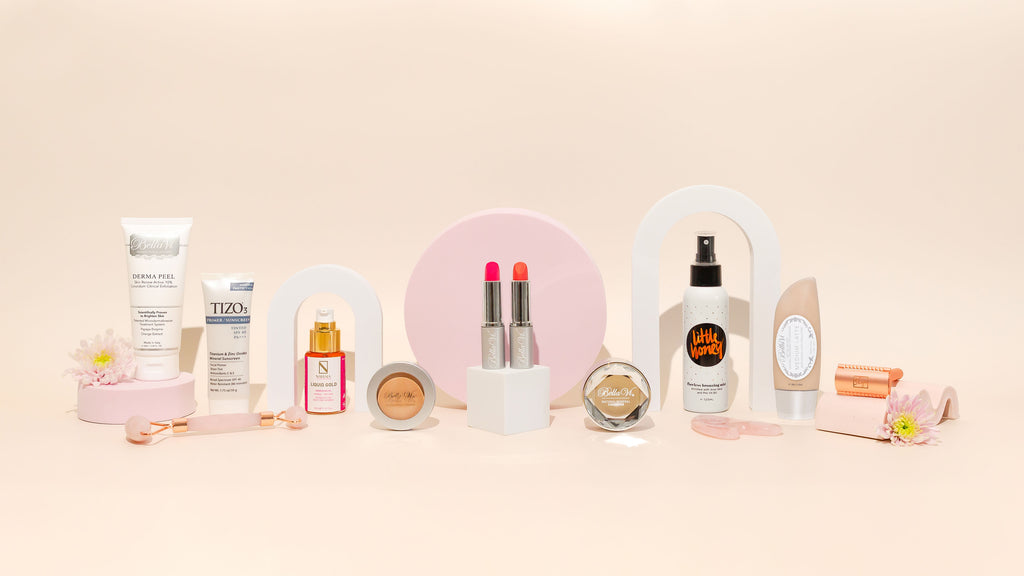 Salon Products, Beauty, Products, and Skincare Products lad out on pink background, products sold by Magnolia Beauty, Online Skincare Shop.